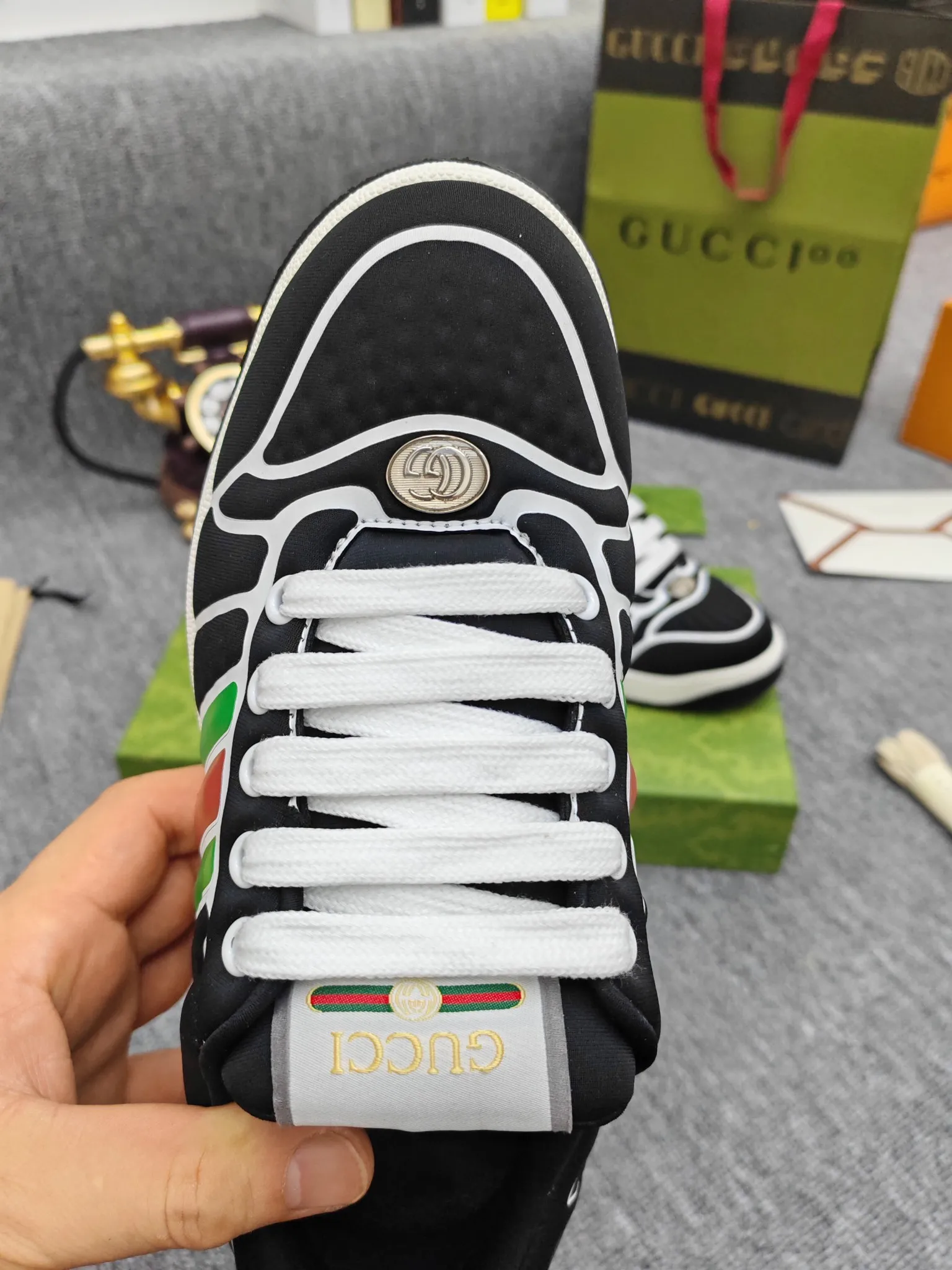 Factory price 600💰Screener series embellished web sneakers. This item is from the Gucci Lido series. Its design is inspired by the summer style and beach clubs of the Italian coast. The Screener series of sneakers draws inspiration from classic sneakers from the 1970s and takes its name from a special defensive move in sports. This shoe from the 2024 Pre-Fall collection is crafted from yellow rubber, a technical and malleable opaque material, with striped webbing on the sides and an embossed Gucci printed logo on the heel. Yellow rubber, opaque and technological in appearance. Red and green webbing decorated with metal Double G oval enamel details. Gucci printed embossed logo. Women 35-40, men 38-45, (men 38 and 45 need to be customized)